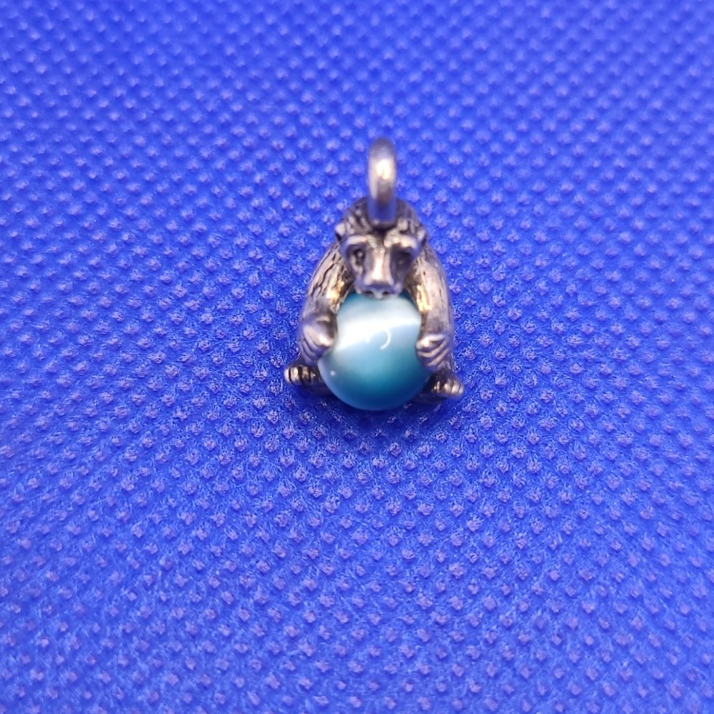 Sterling Silver Bear Holding A Ball Pendant